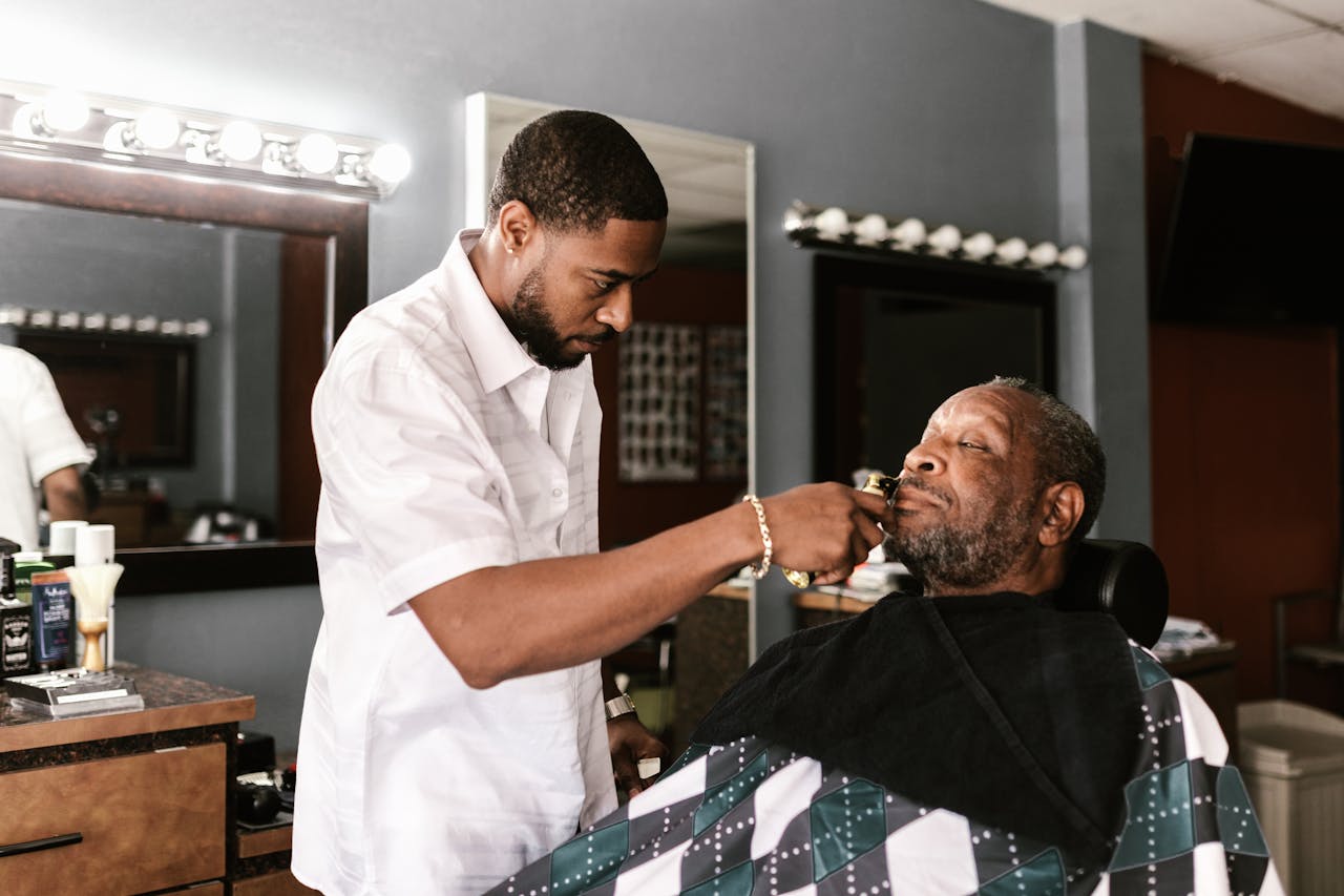 Barber Using Trimmer