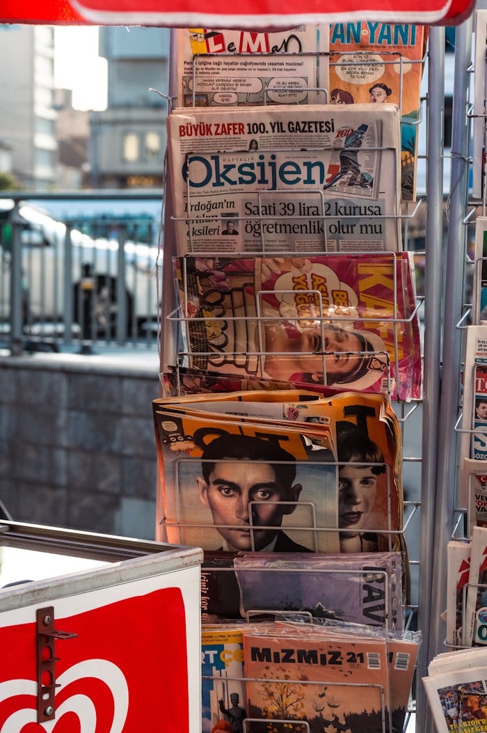 A vibrant display of newspapers at an outdoor stand in Istanbul, Turkey.